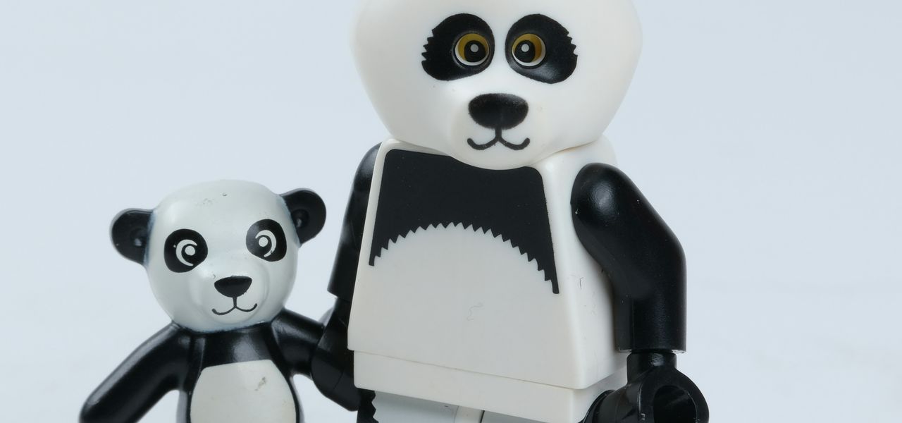 white and black panda figurine