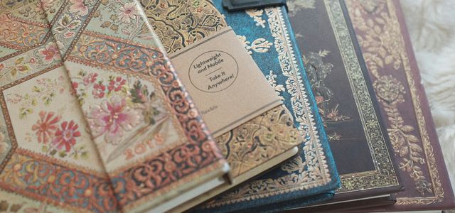 white and blue floral book