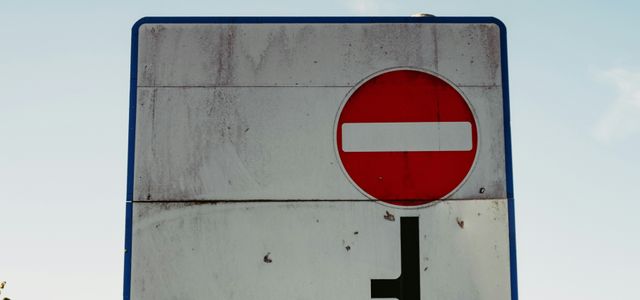 white and red no smoking sign