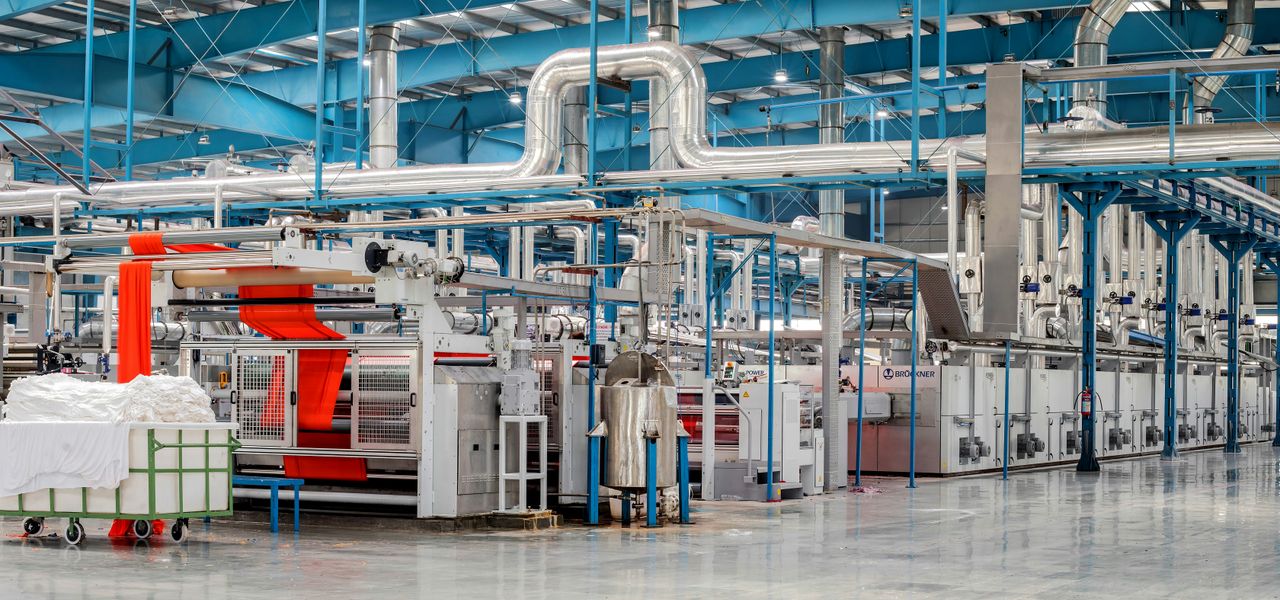 white and red train in a train station