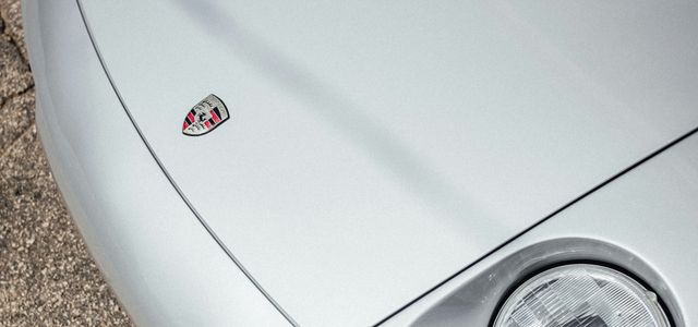 white car on brown concrete floor