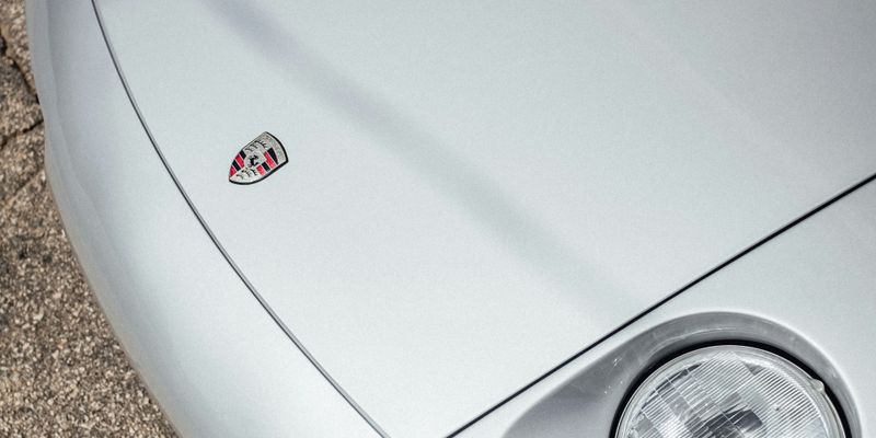 white car on brown concrete floor