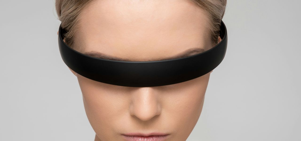 woman wearing black Alice band