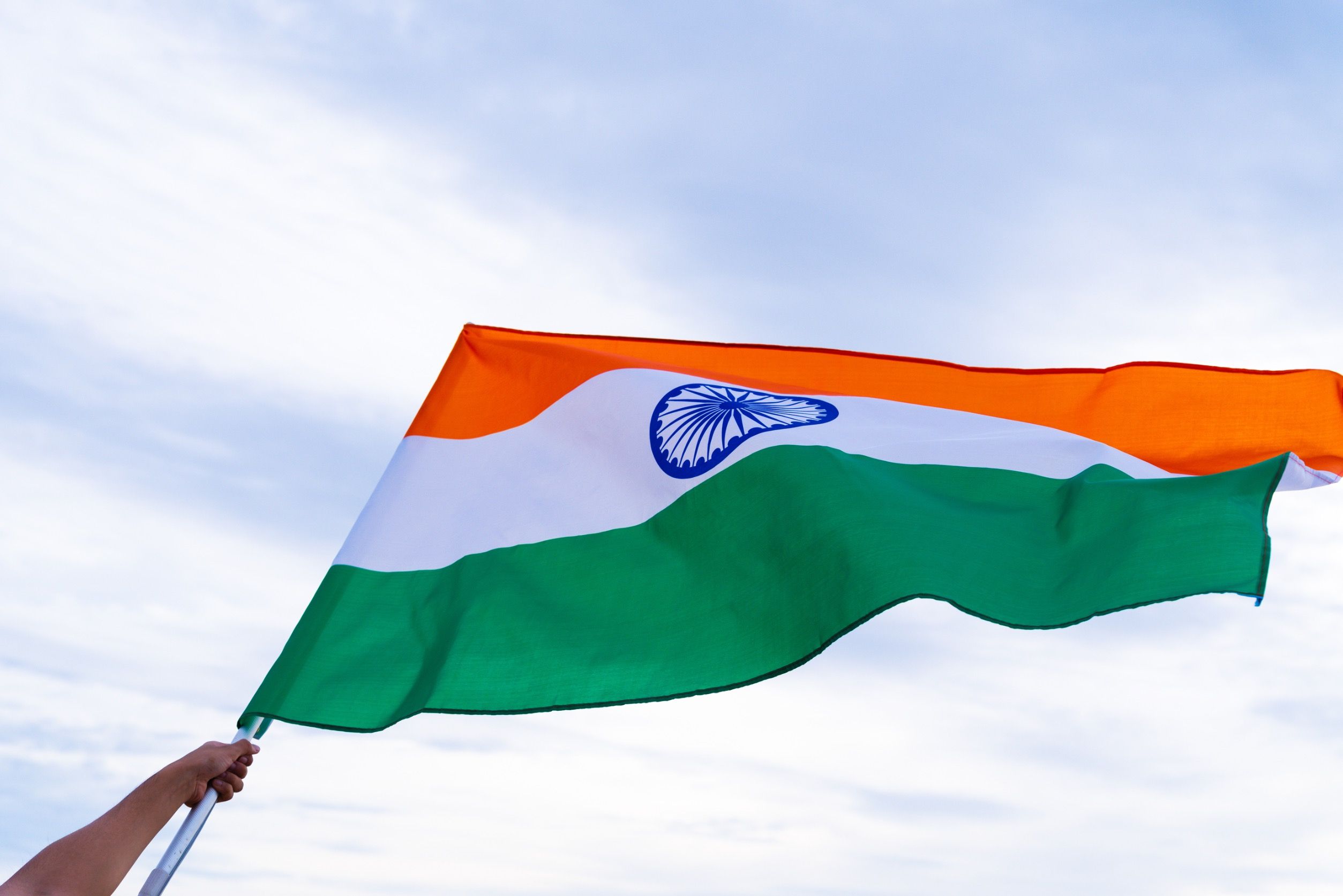 A man waving the Indian Flag.