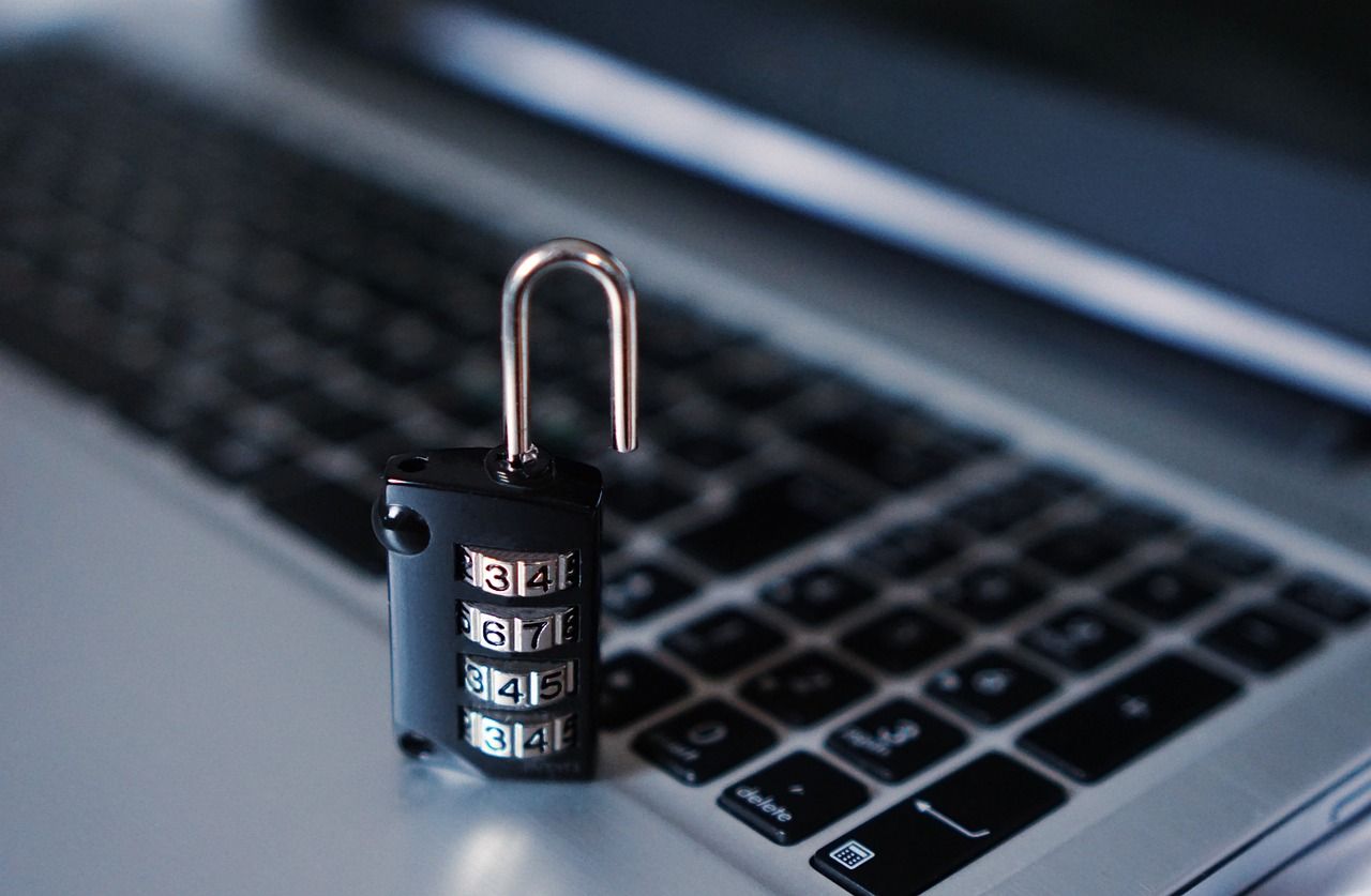 Padlock on top of a laptop.