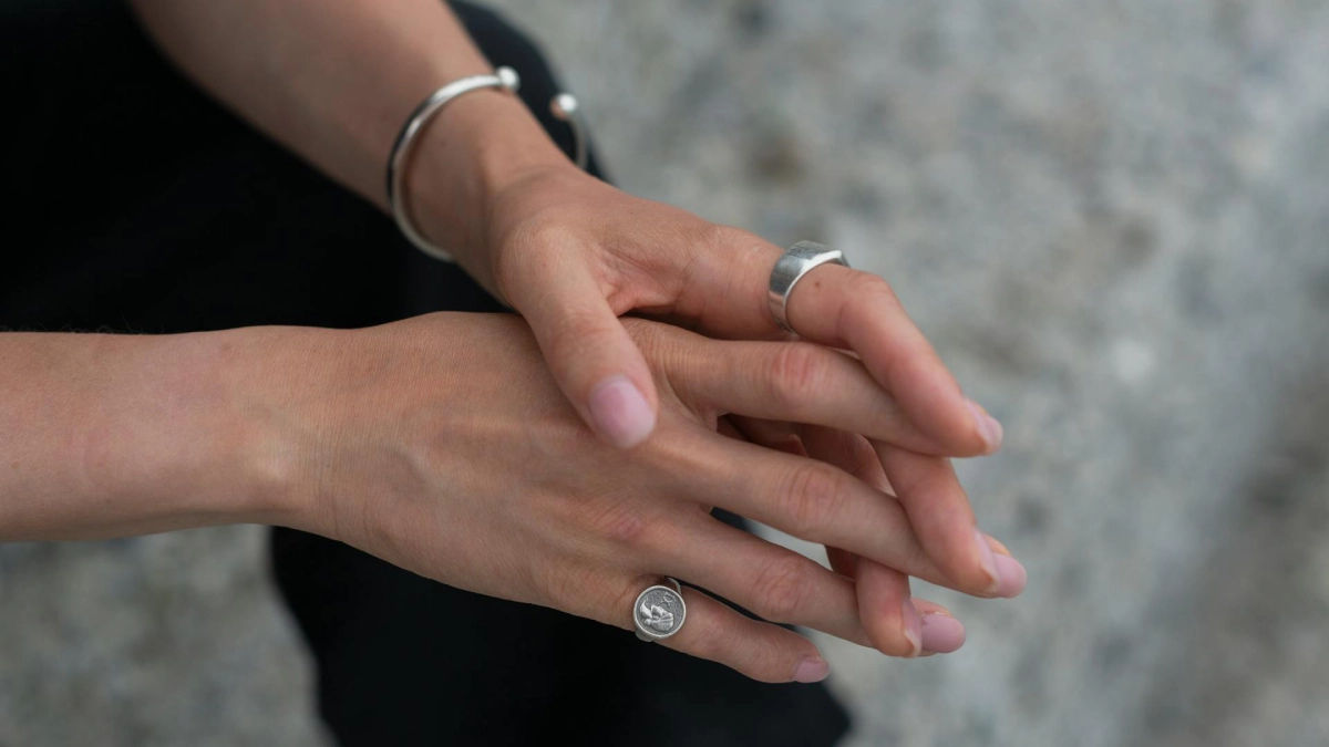 Person wearing Sterling Silver rings Jewelry