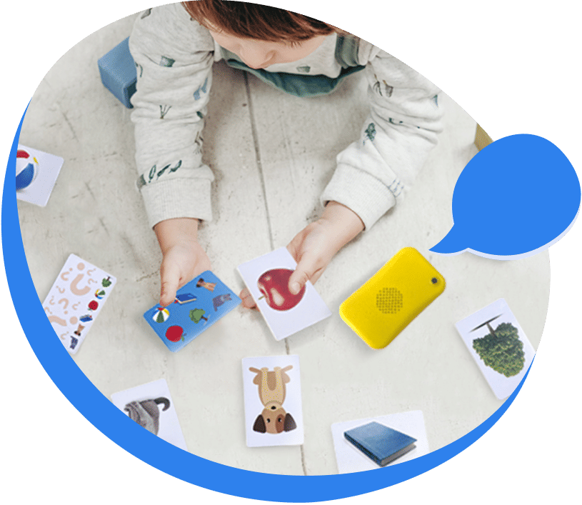 Child playing with Talkido cards