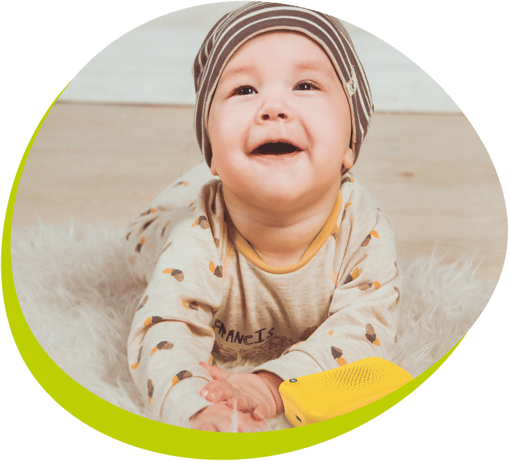 Happy child with Talkido device