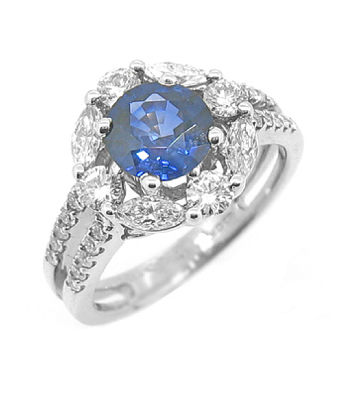 Sapphire and cluster ring with double row diamond shouldersPictured item: 1.55cts sapphire/0.96cts diamonds set in 18k white gold