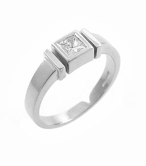 Princess cut diamond rubover set solitaire ring in 18 ct white gold