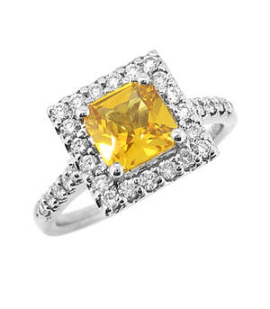 Yellow sapphire and diamond cluster ring in 18 ct white gold