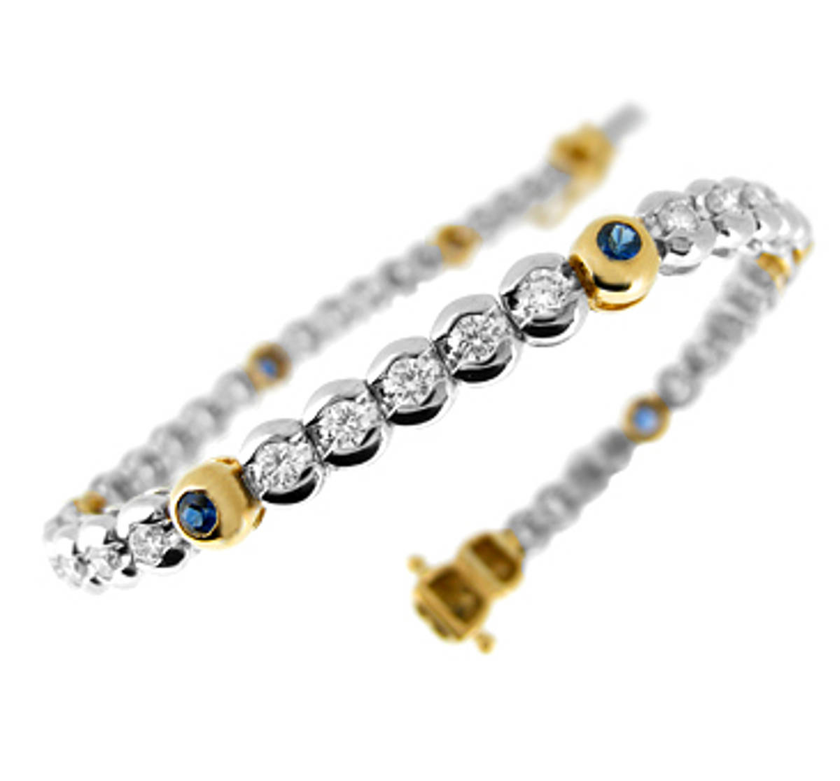 Sapphire diamond rubover set line braceletAvailable in: 18k goldPictured item: 0.70ct sapphire/2.42ct brilliant cut diamond set in 18k yellow/white gold