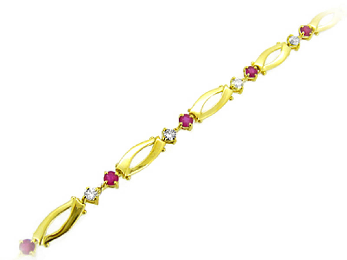 Ruby and diamond braceletAvailable in: 18k goldPictured item: 0.80cts brilliant cut diamonds/1.28cts ruby set in 18k yellow gold