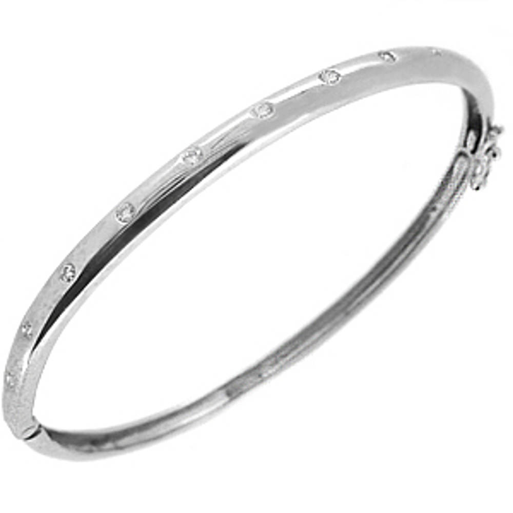 9k white gold brilliant cut diamond bangle
Total diamond weight 0.26cts ONE SIZEMade in Ireland