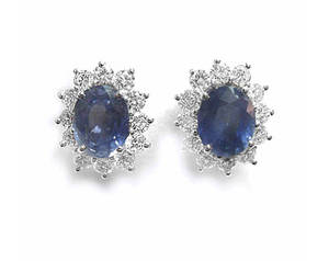 Oval sapphire and diamond cluster stud earrings in 18 ct white gold