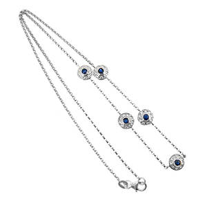 Sapphire and diamond cluster necklace in 18 ct white gold