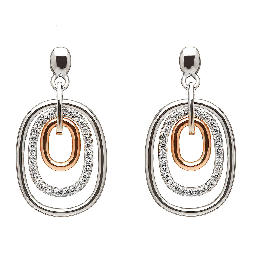 silver and rare Irish rose gold drop earrings with white topaz stones.