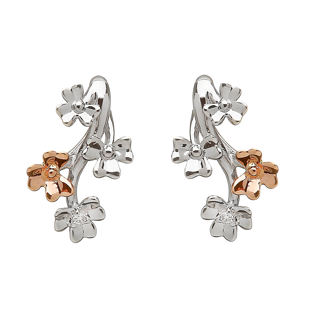 diamond set 9 carat white gold love shamrock stud spray earrings with one rare Irish rose gold flower.