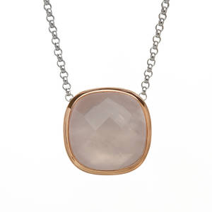 House of Lor silver/rose gold pendant with rose quartz stone outer rim made from rare Irish gold