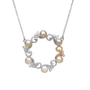 silver and rare Irish rose gold Celtic pearl pendant.