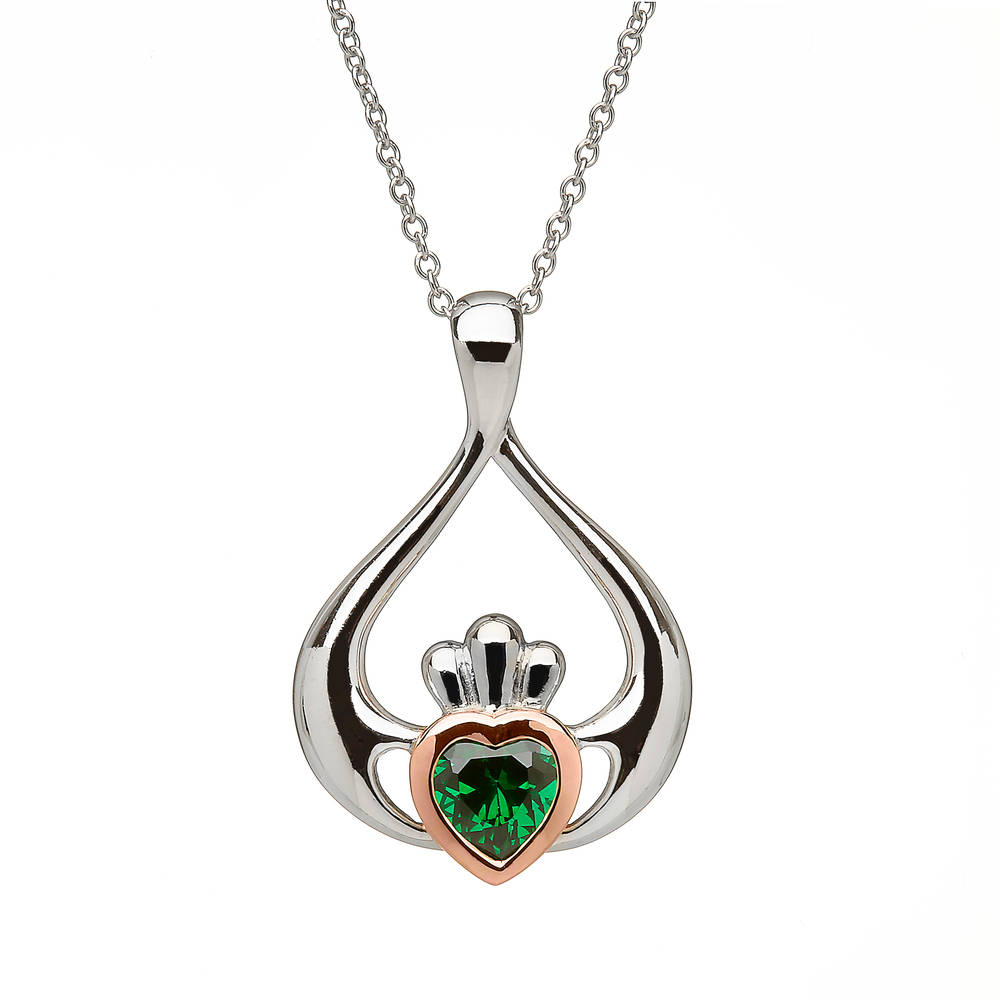 sterling silver and rare Irish rose gold Claddagh pendant with green cz stone.
