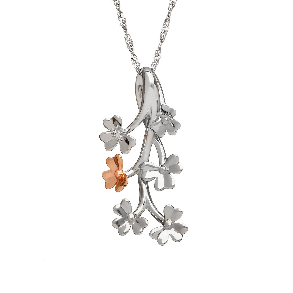 diamond set 9 carat white gold love shamrock spray pendant with one rare Irish rose gold flower.