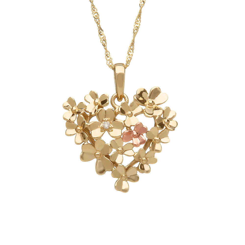 sterling silver and rare Irish rose gold diamond set love shamrock heart bouquet pendant.