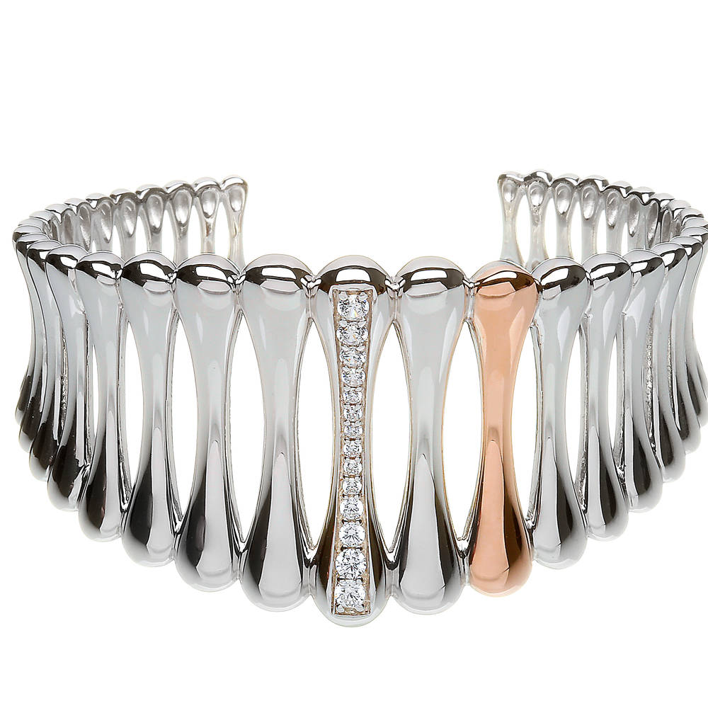 sterling silver and rare Irish rose gold bar bangle with one bar in rose gold and one bar set with czs.