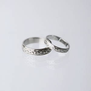 10 carat white gold man's love knot ring