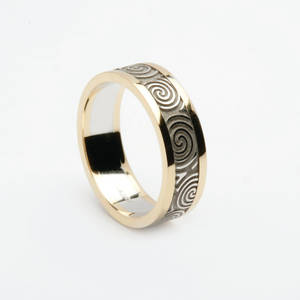 10 carat white gold man's New Grange inspired ring with yellow gold rims
