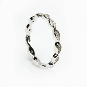 Platinum Celtic lady's two lines entwined wedding ring with 0.10 carat total weight diamonds.