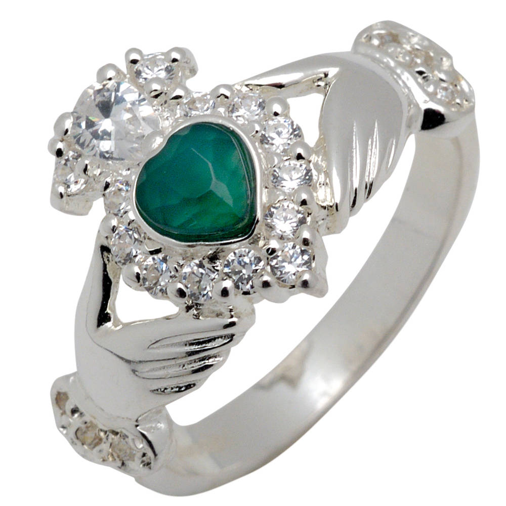 Silver claddagh ring with green heart shaped agate and cubic zirconias setting.
