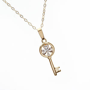 10 carat yellow gold shamrock key pendant
