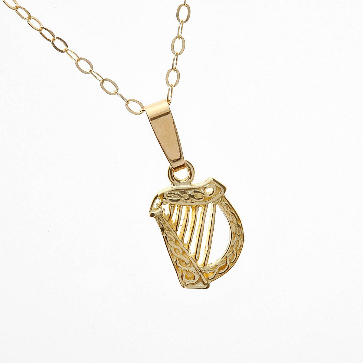 10ct yellow gold harp pendant on an 18-inch chain.