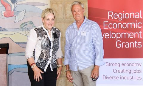 Government Minister standing next to NLE CEO Alan Beattie