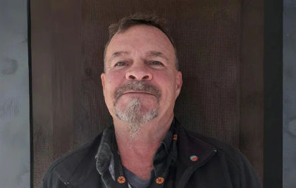 headshot of glenn