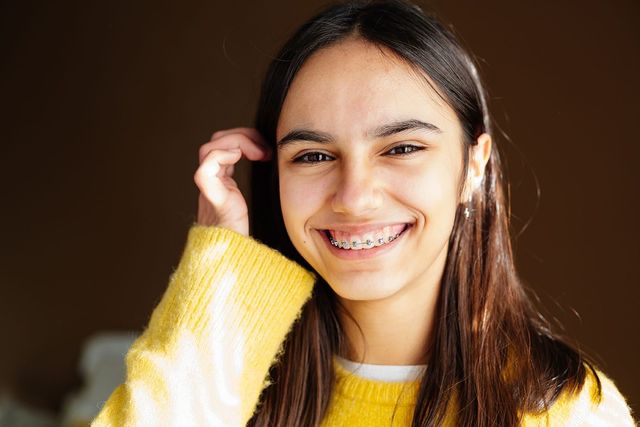 teen-smiling-braces