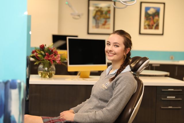 teenage girl smiling at camera