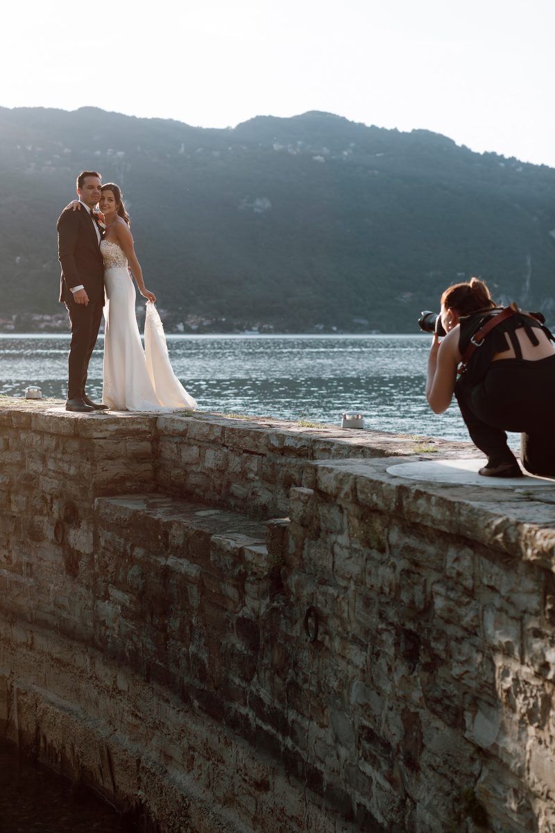 Wedding photographer Katie Harmsworth lines up a stunning shot of a bride and groom.