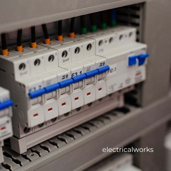 Multifunction tester on open consumer unit - fuse board testing during EICR London NICEIC