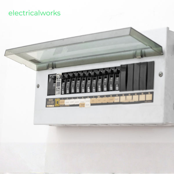 Obsolete rewirable fuse box with asbestos-style carriers — pre-replacement photo London landlord EICR