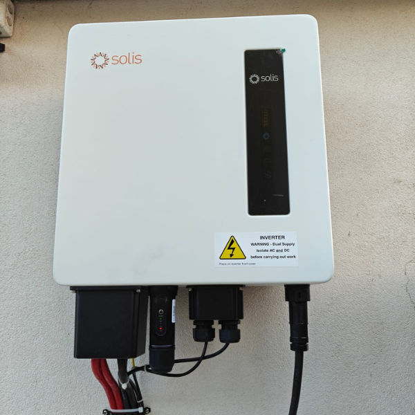 Wall-mounted string inverter with DC isolators — G98 export limitation setup London NICEIC
