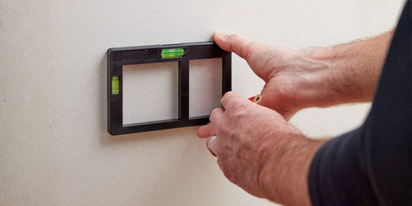 A spirit level on a perfectly installed socket
