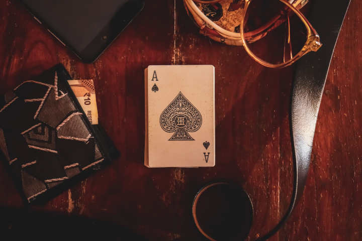 A premium set of playing cards and poker chips on a table