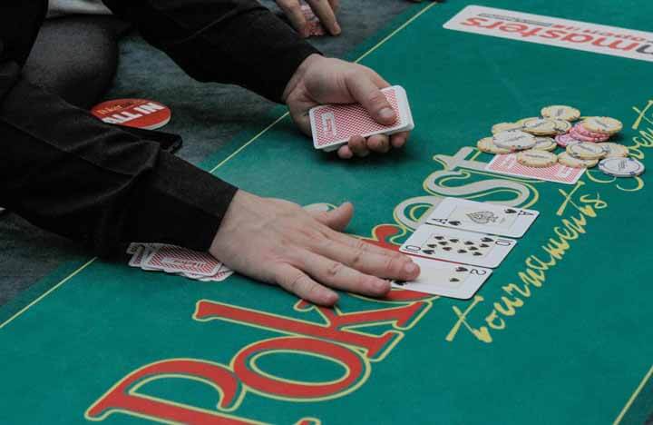 Cards and chips representing the similarities between poker and blackjack.