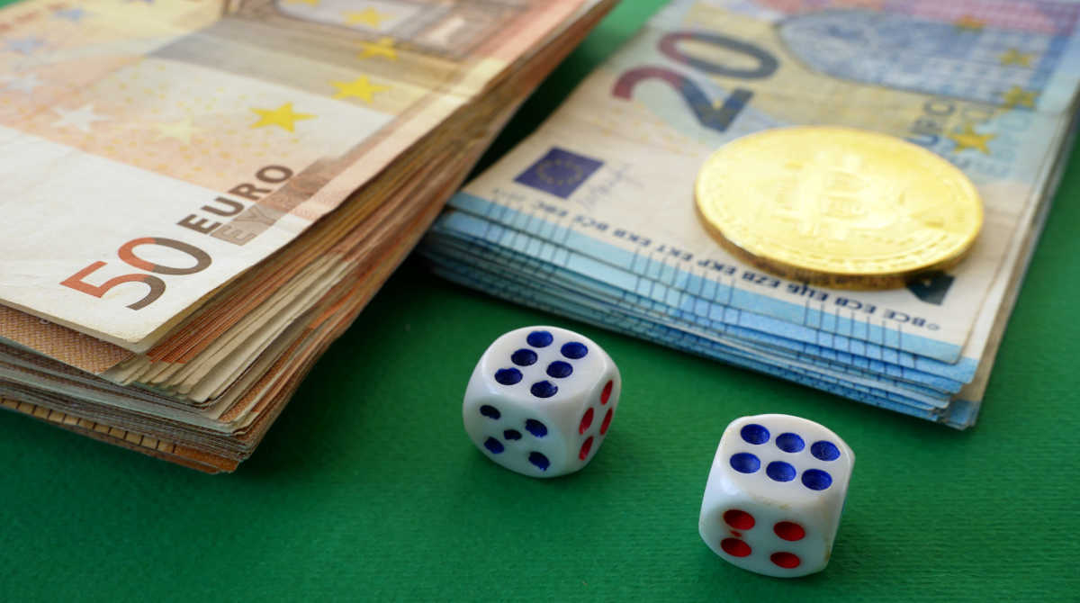 A graph showing economic growth with casino chips and coins.