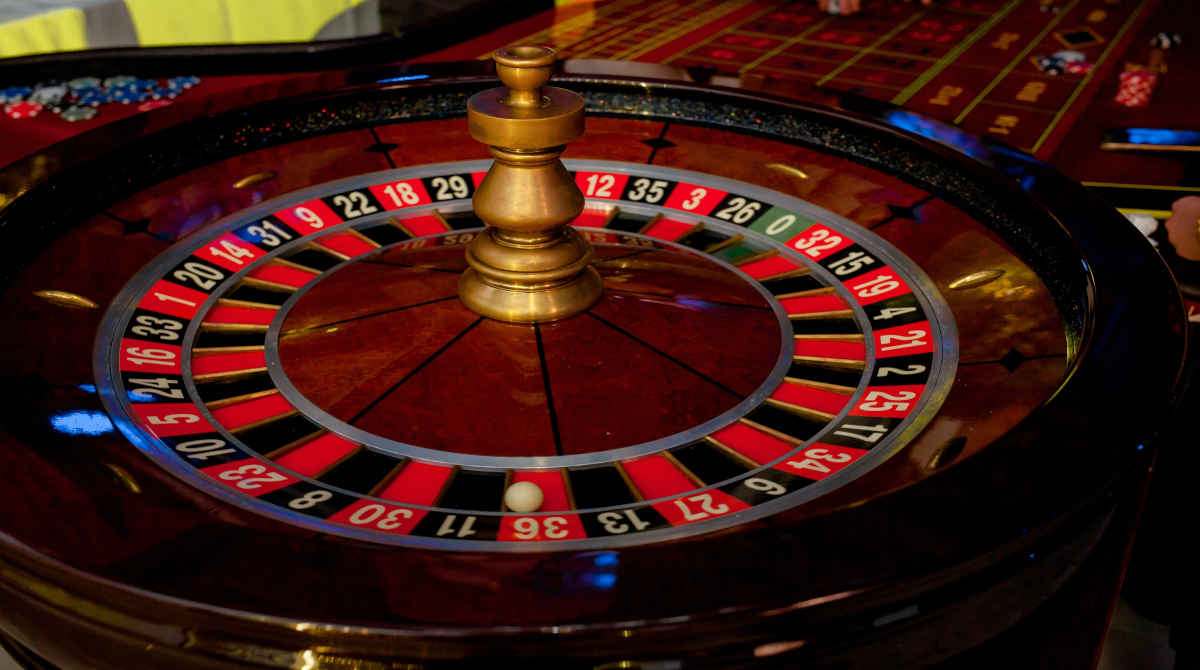 A classic European roulette wheel and betting table layout.