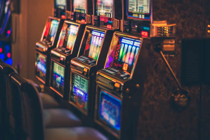A stack of high-value casino chips on a gaming table.