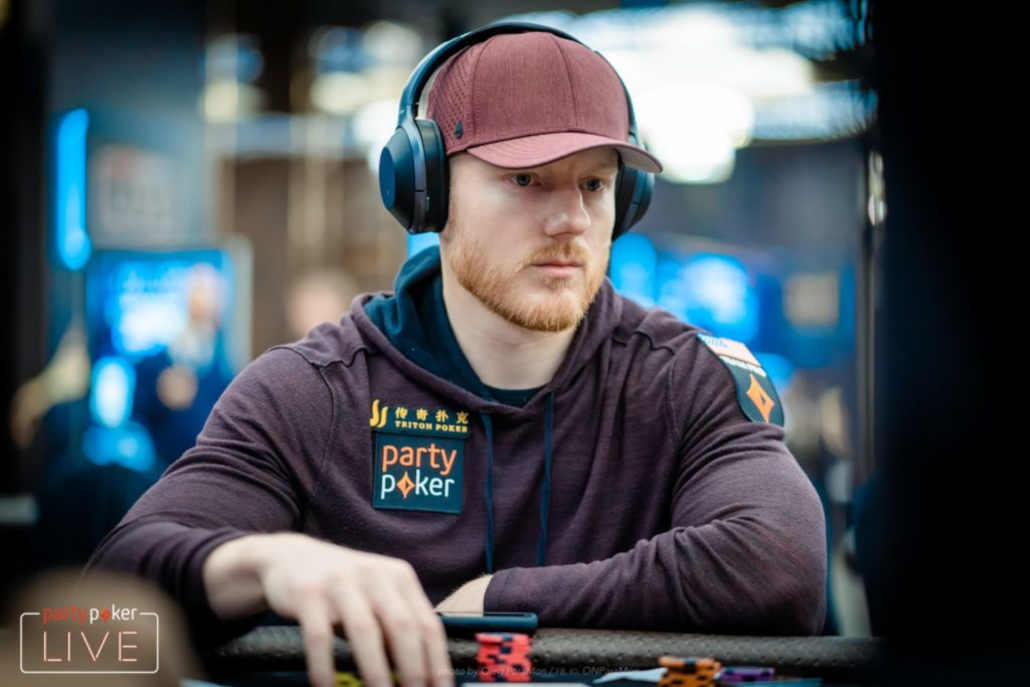 Jason Koon smiling during a poker event.