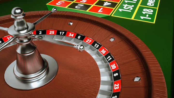 Casino chips placed on a roulette wheel, illustrating a bet.